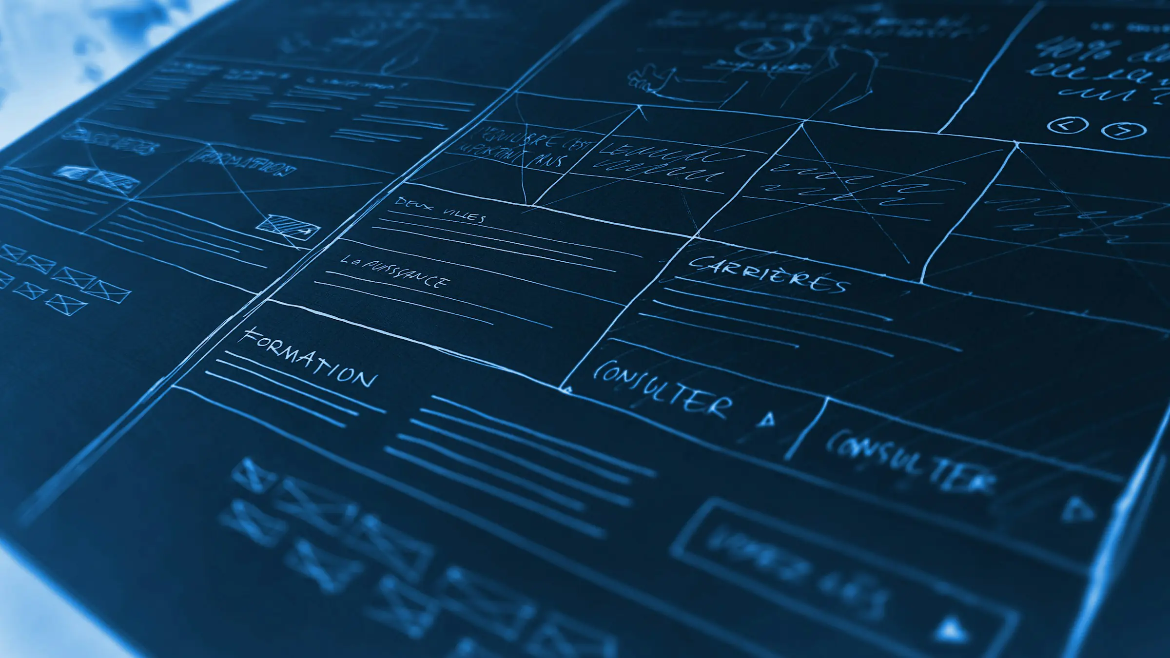 Digital blueprint drawing on a blue screen