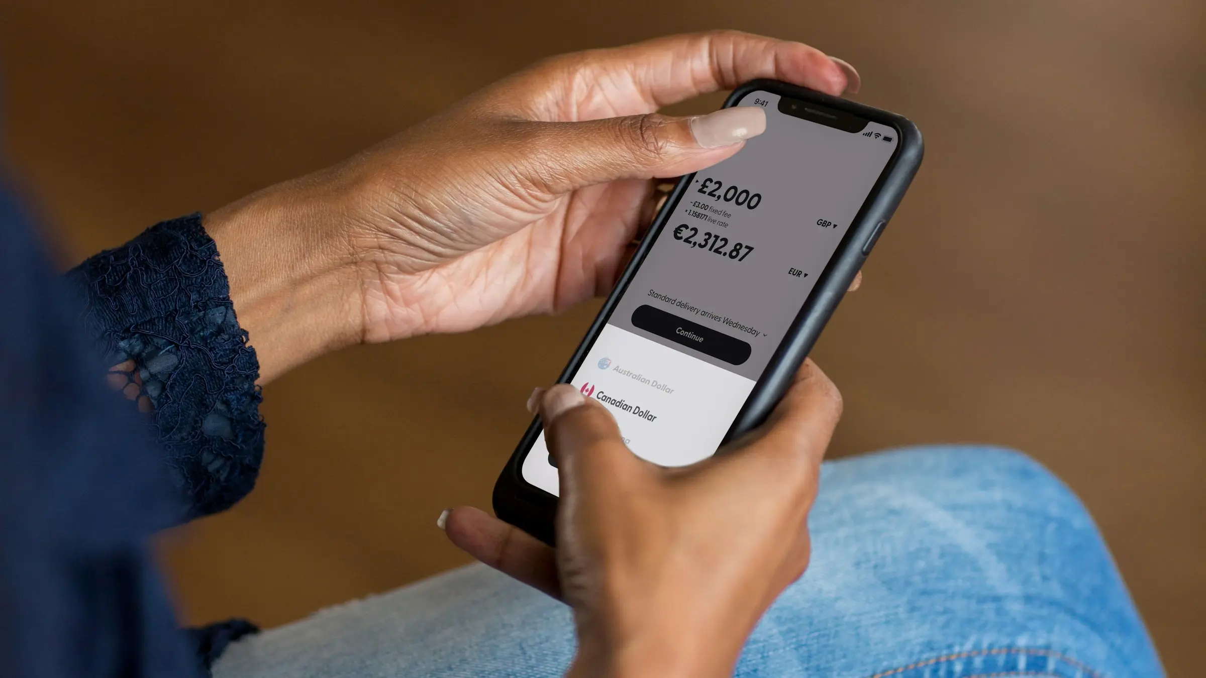 Person checking an account balance in a banking app