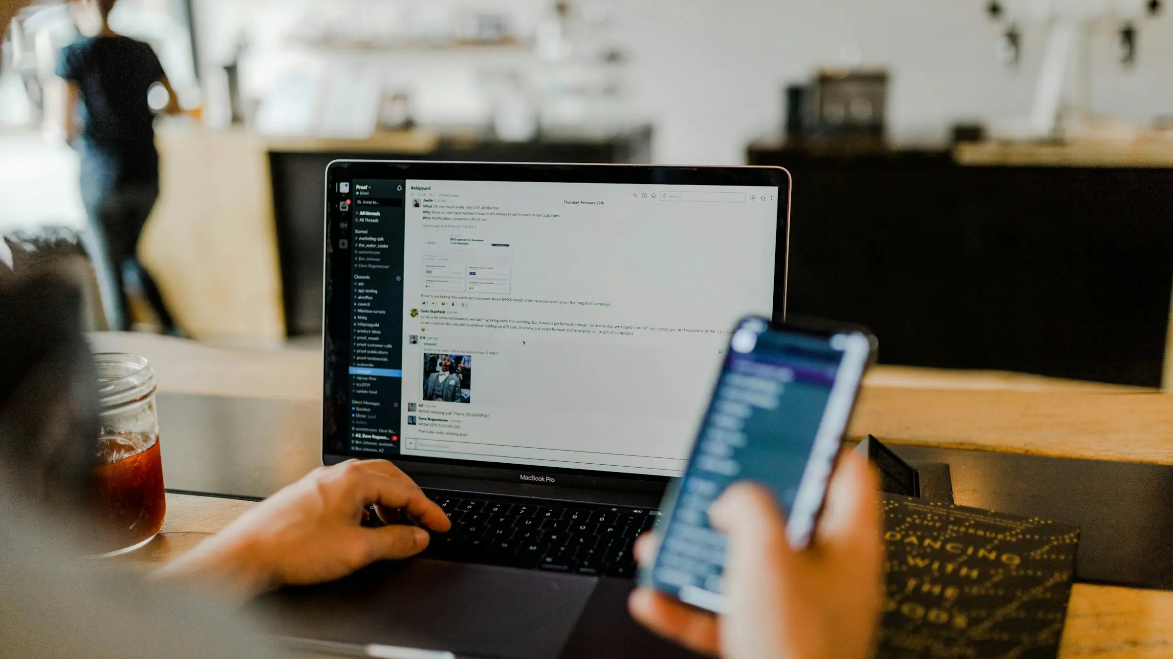 Person using a SaaS product on a laptop and phone