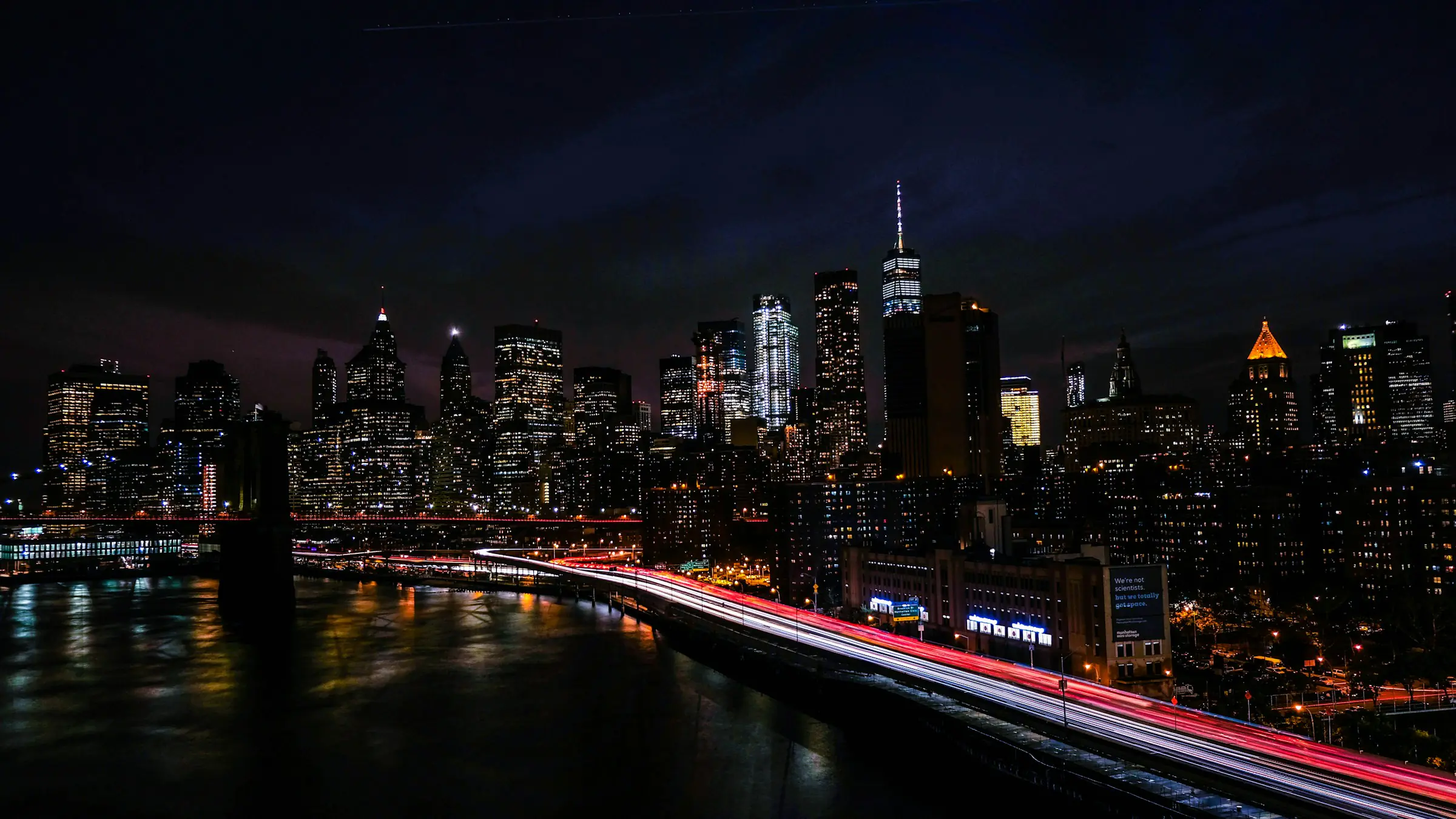 New York City skyline at night seen across the river